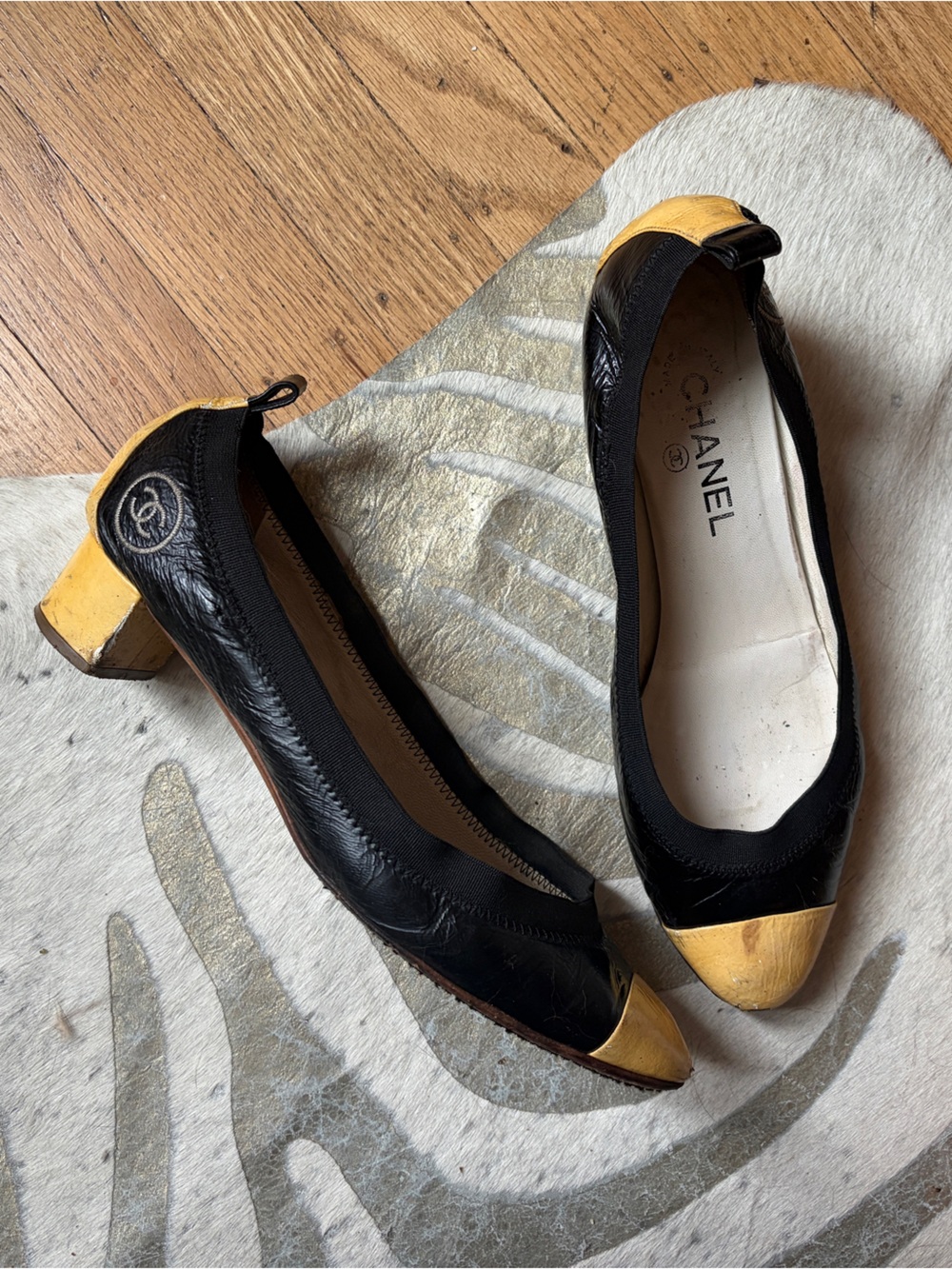 CHANEL Black and Yellow Patent Leather Cap-Toe Ballet Pumps